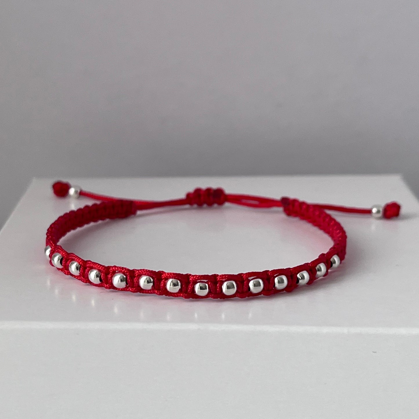 Pulsera roja de Plata